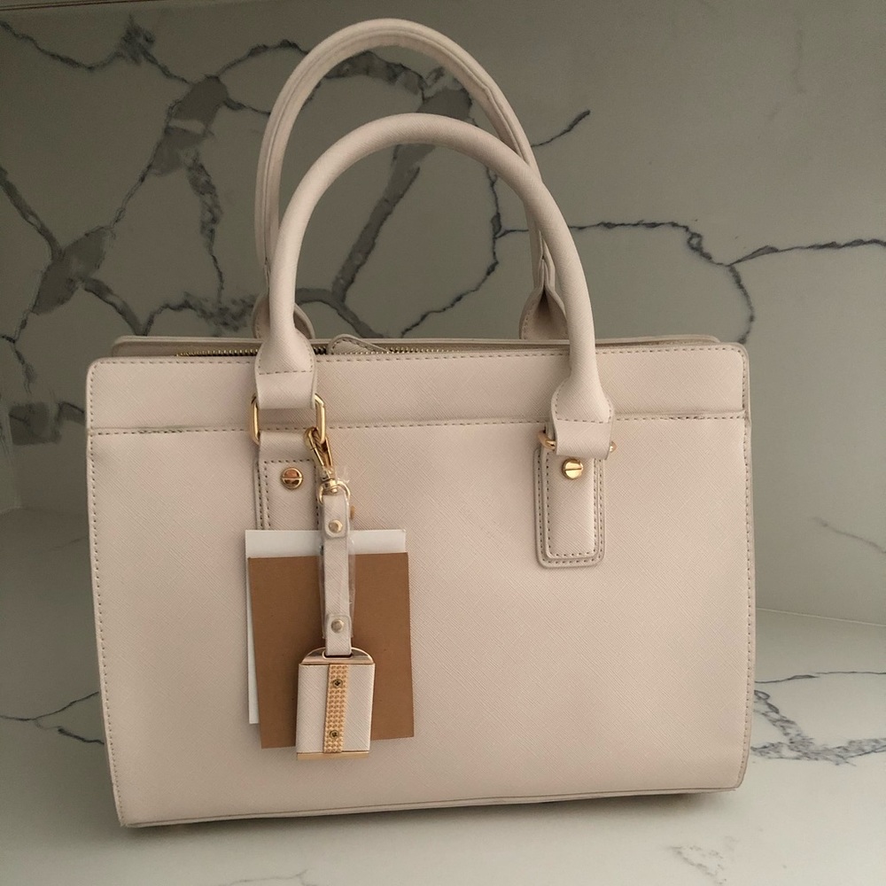 BRAND NEW!!! Pink cream bag